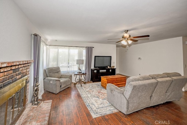 40022 172nd St E, Palmdale, CA 93591 - living area with hardwood / wood-style floors, a brick fireplace, and ceiling fan