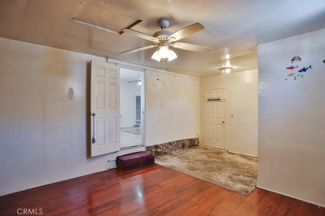 2851 Webster Ave, Long Beach, CA 90810 - empty room with a ceiling fan and wood finished floors