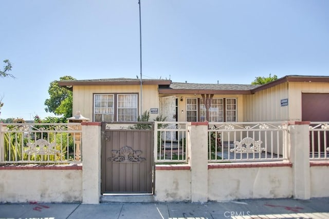 2851 Webster Ave, Long Beach, CA 90810 - view of front of home featuring a fenced front yard and a gate
