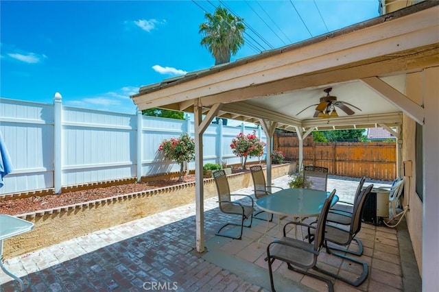 25176 Wendy Way, Moreno Valley, CA 92551 - fenced backyard featuring a ceiling fan, outdoor dining space, and a patio area