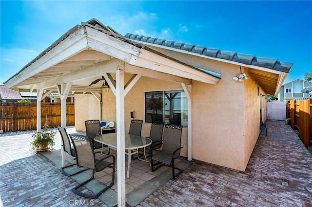 25176 Wendy Way, Moreno Valley, CA 92551 - wooden deck with a patio area, a fenced backyard, and outdoor dining space