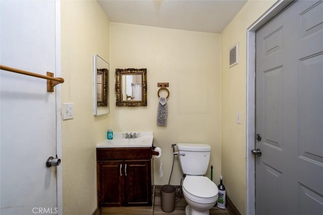 25176 Wendy Way, Moreno Valley, CA 92551 - bathroom with baseboards, vanity, and toilet