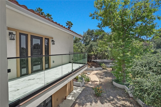 255 El Cielo Ln, Bradbury, CA 91008 - view of home's exterior featuring stucco siding and a patio area