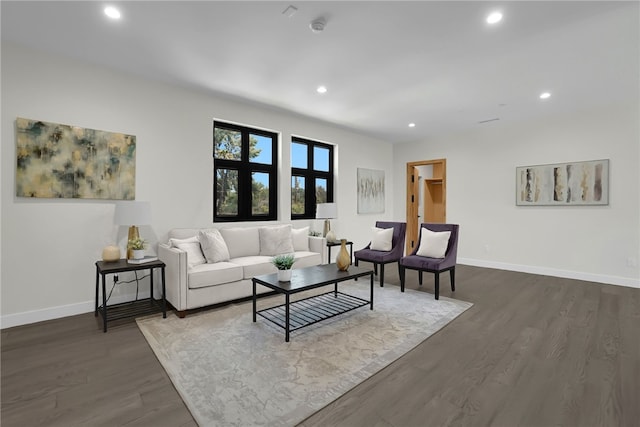 living room with recessed lighting, dark wood-type flooring, and baseboards