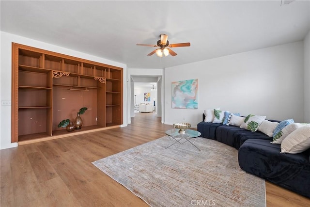 225 Caldera Ln, Hemet, CA 92545 - living room featuring a ceiling fan and light wood-style flooring