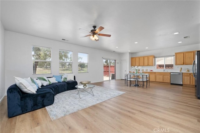 225 Caldera Ln, Hemet, CA 92545 - living room featuring a ceiling fan, light wood finished floors, recessed lighting, and baseboards