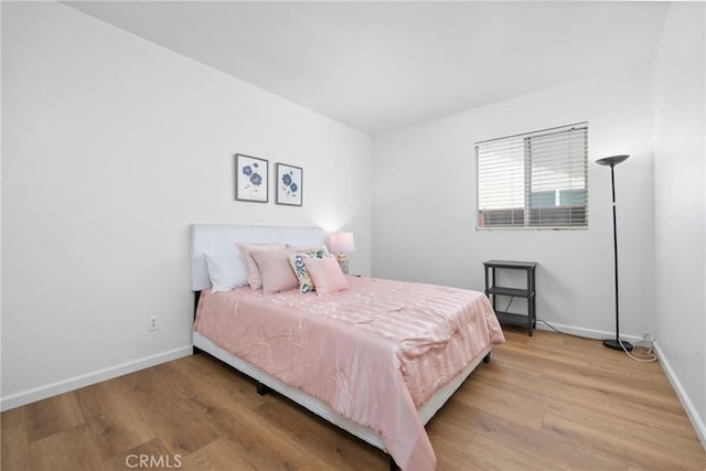 225 Caldera Ln, Hemet, CA 92545 - bedroom with wood finished floors and baseboards