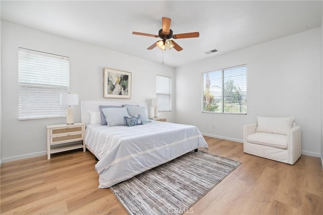 225 Caldera Ln, Hemet, CA 92545 - bedroom with light wood finished floors, baseboards, and ceiling fan