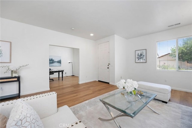 225 Caldera Ln, Hemet, CA 92545 - living room featuring wood finished floors, recessed lighting, and baseboards