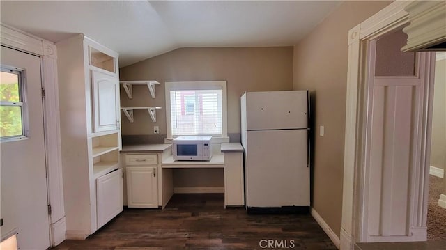 533 S Kaweah Ave, Exeter, CA 93221 - kitchen featuring white appliances, open shelves, dark wood-style flooring, lofted ceiling, and white cabinets