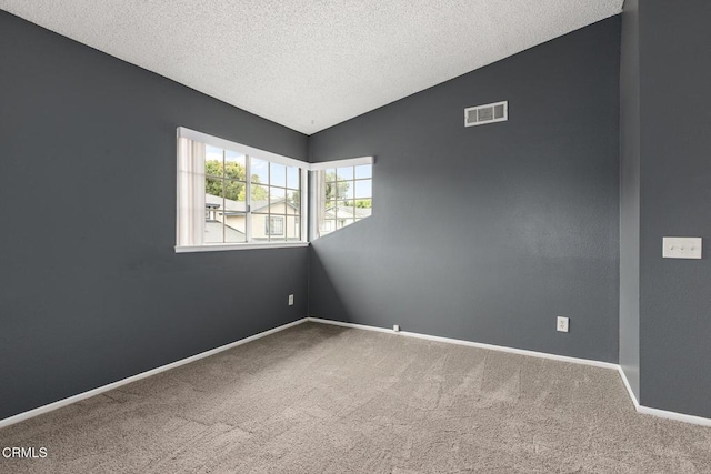 817 Copper Privado, Ontario, CA 91762 - unfurnished room featuring carpet flooring, a textured ceiling, baseboards, and vaulted ceiling
