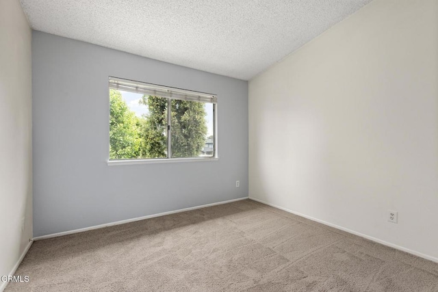 817 Copper Privado, Ontario, CA 91762 - carpeted empty room with a textured ceiling and baseboards