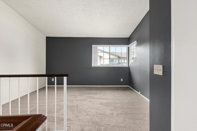 817 Copper Privado, Ontario, CA 91762 - carpeted empty room with a textured ceiling and baseboards