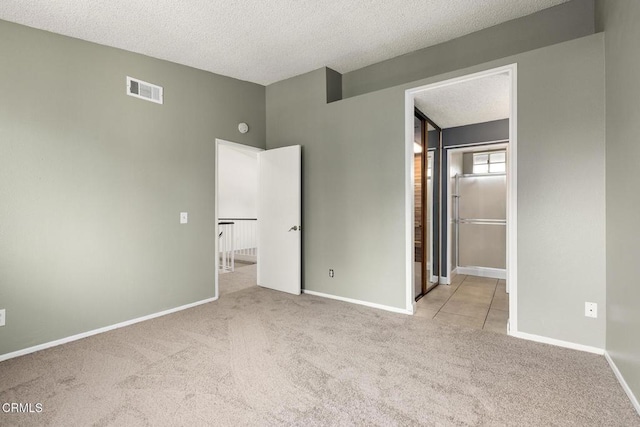 817 Copper Privado, Ontario, CA 91762 - unfurnished bedroom with carpet flooring, a textured ceiling, and baseboards