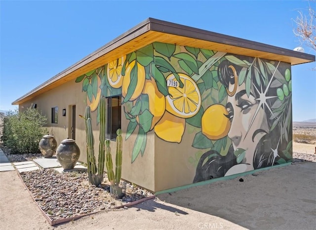 view of home's exterior featuring stucco siding