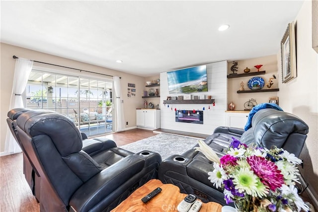 5471 Santa Gertrudes Ave, Garden Grove, CA 92845 - living area with wood finished floors, recessed lighting, and baseboards