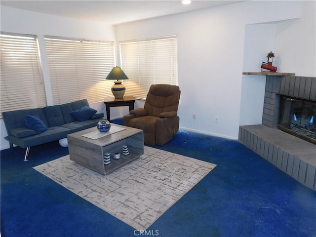 10755 Jasper Ave, Redlands, CA 92374 - living room with carpet floors, a fireplace, baseboards, and recessed lighting