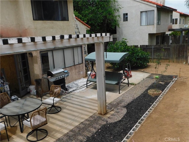 10755 Jasper Ave, Redlands, CA 92374 - view of patio with a grill and fence