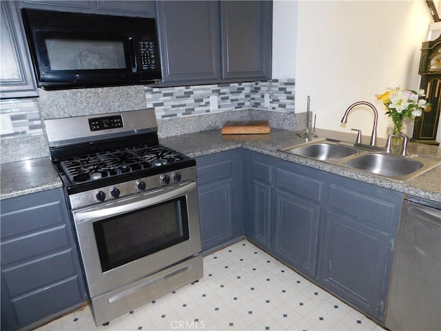 10755 Jasper Ave, Redlands, CA 92374 - kitchen with stainless steel appliances, a sink, blue cabinetry, and light floors