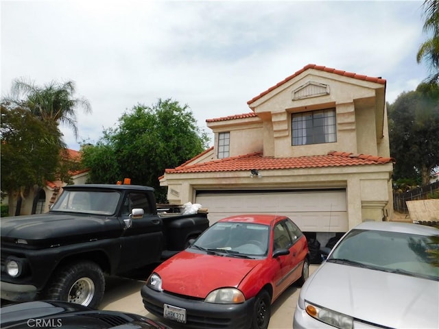 10755 Jasper Ave, Redlands, CA 92374 - view of front of property featuring stucco siding and a tiled roof