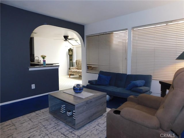 10755 Jasper Ave, Redlands, CA 92374 - living area featuring arched walkways and a ceiling fan