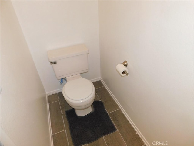 10755 Jasper Ave, Redlands, CA 92374 - bathroom with toilet and baseboards