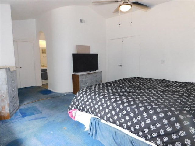 10755 Jasper Ave, Redlands, CA 92374 - bedroom featuring vaulted ceiling, arched walkways, carpet floors, a closet, and a ceiling fan