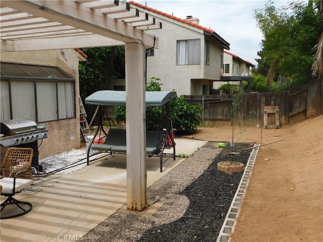 10755 Jasper Ave, Redlands, CA 92374 - view of yard featuring a patio, fence, and a pergola