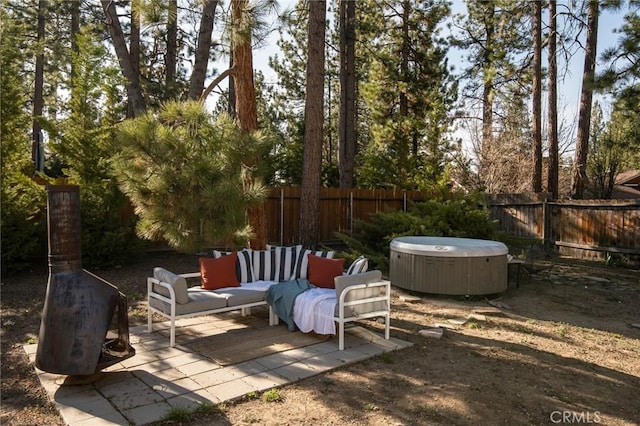 view of patio with a fenced backyard and an outdoor hangout area