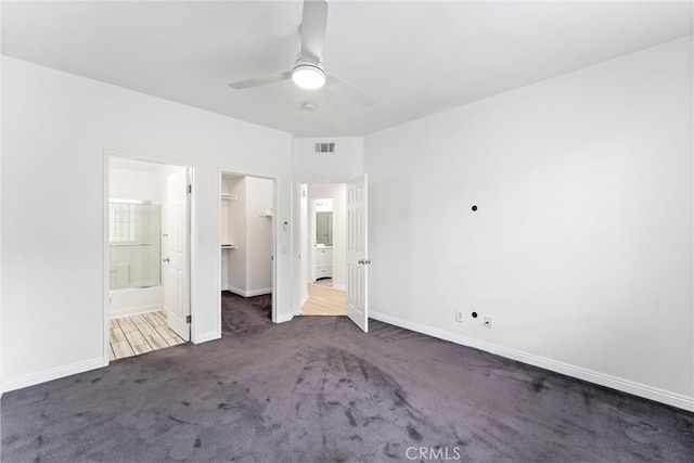21848 S Vermont Ave Unit 6, Torrance, CA 90502 - unfurnished bedroom with carpet, ensuite bath, a spacious closet, a ceiling fan, and a closet