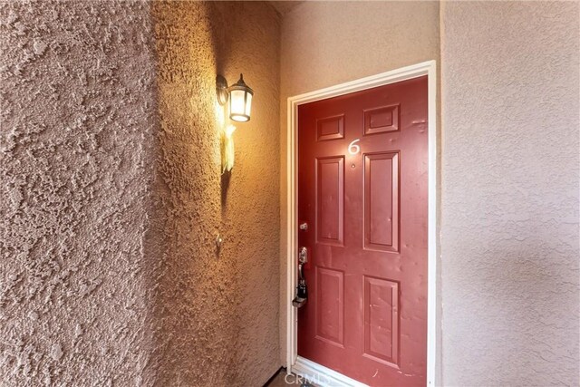 21848 S Vermont Ave Unit 6, Torrance, CA 90502 - doorway to property with stucco siding