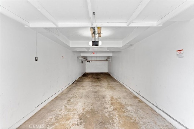 21848 S Vermont Ave Unit 6, Torrance, CA 90502 - garage featuring a garage door opener
