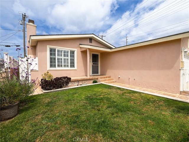 22305 Ladeene Ave, Torrance, CA 90505 - view of front of house with stucco siding and a chimney