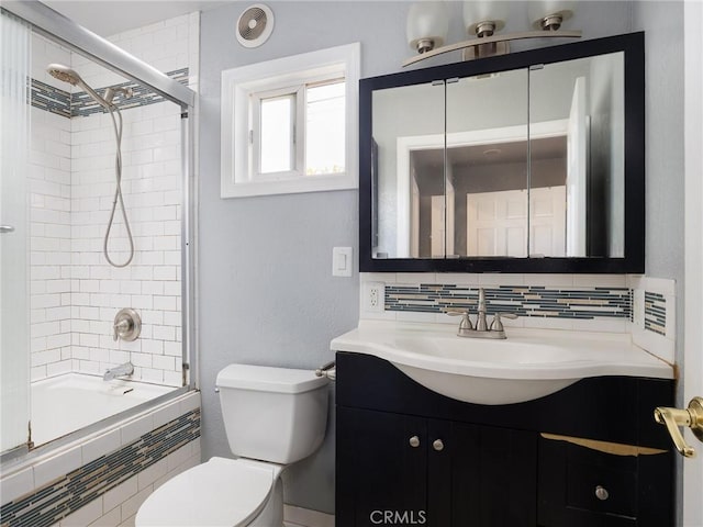 22305 Ladeene Ave, Torrance, CA 90505 - bathroom with toilet, decorative backsplash, vanity, and tiled shower / bath