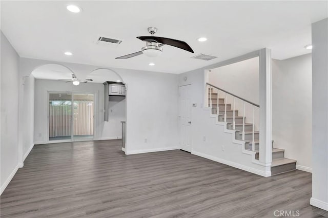 17053 Roscoe Blvd Unit 3, Northridge, CA 91325 - unfurnished living room with ceiling fan, wood finished floors, recessed lighting, baseboards, and arched walkways