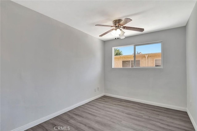 17053 Roscoe Blvd Unit 3, Northridge, CA 91325 - unfurnished room featuring baseboards, wood finished floors, and a ceiling fan