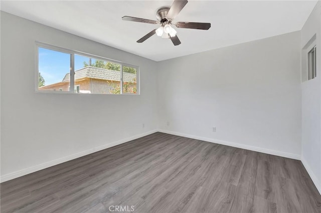 17053 Roscoe Blvd Unit 3, Northridge, CA 91325 - empty room with wood finished floors, baseboards, and ceiling fan