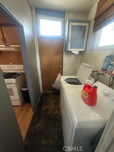 1815 W 9th St, Pomona, CA 91766 - laundry area with washer and dryer, healthy amount of natural light, and wood finished floors