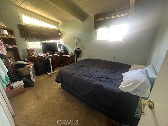 1815 W 9th St, Pomona, CA 91766 - bedroom featuring carpet flooring, wooden ceiling, and beam ceiling
