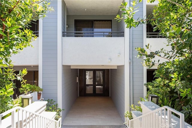 270 Cagney Ln Unit 215, Newport Beach, CA 92663 - doorway to property featuring french doors and a balcony