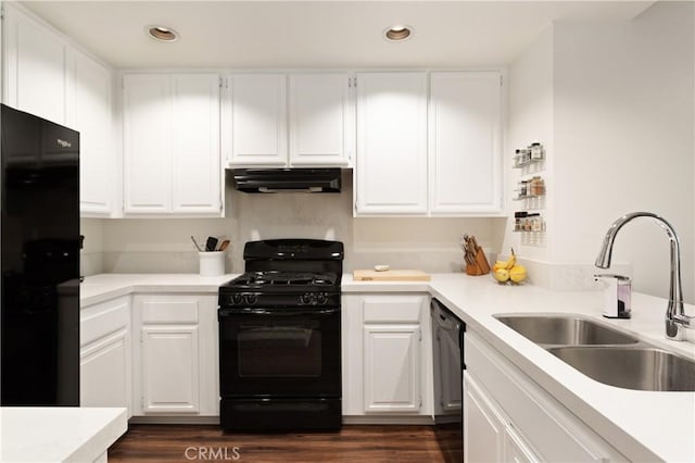 270 Cagney Ln Unit 215, Newport Beach, CA 92663 - kitchen with black appliances, a sink, under cabinet range hood, recessed lighting, and white cabinets