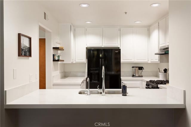270 Cagney Ln Unit 215, Newport Beach, CA 92663 - kitchen with black appliances, a sink, open shelves, white cabinetry, and recessed lighting