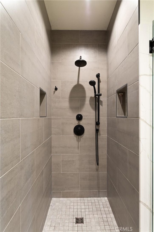 270 Cagney Ln Unit 215, Newport Beach, CA 92663 - full bathroom with a tile shower