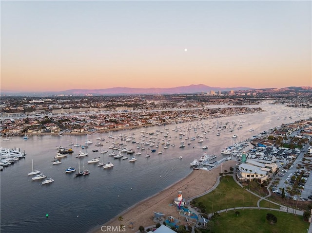 270 Cagney Ln Unit 215, Newport Beach, CA 92663 - aerial view at dusk of view of marina and a water and mountain view
