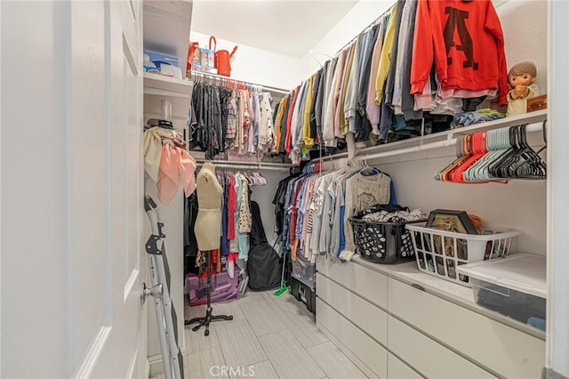 38740 25th St E, Palmdale, CA 93550 - spacious closet featuring tile patterned flooring