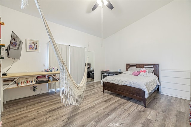 38740 25th St E, Palmdale, CA 93550 - bedroom with wood finished floors, high vaulted ceiling, and a ceiling fan