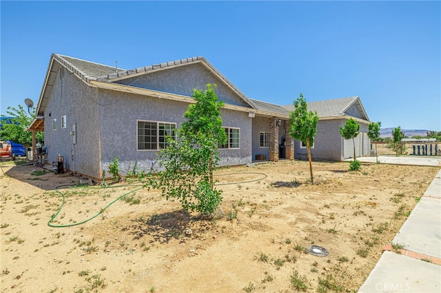 38740 25th St E, Palmdale, CA 93550 - view of front facade featuring stucco siding