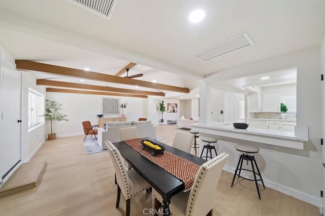 18710 Corwin Rd, Apple Valley, CA 92307 - dining room with recessed lighting, light wood-style flooring, beamed ceiling, and baseboards
