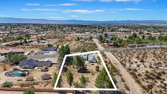 18710 Corwin Rd, Apple Valley, CA 92307 - aerial perspective of suburban area featuring mountains and property parcel outlined
