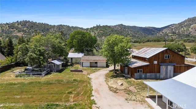 view from above of property with a mountainous background